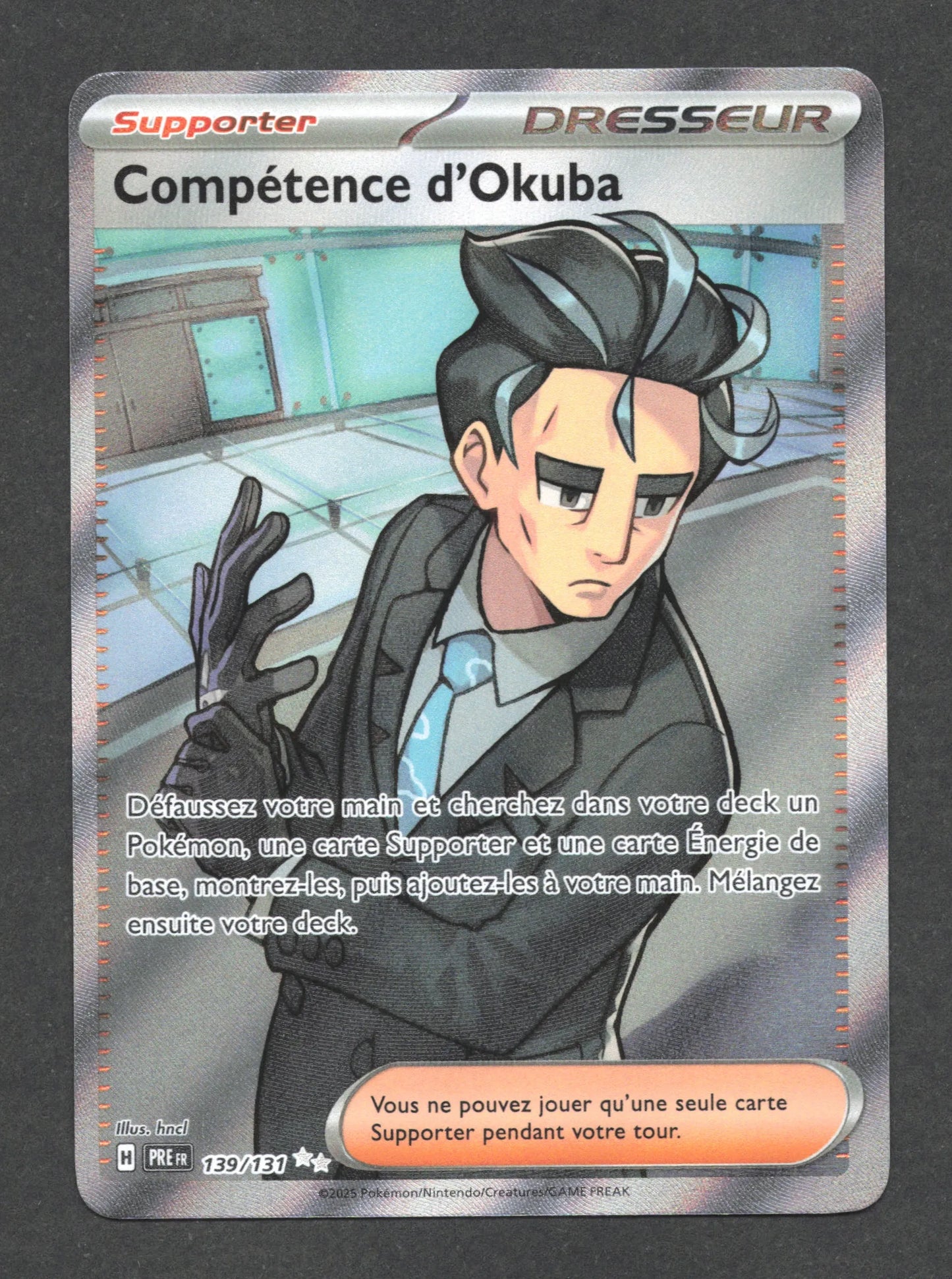 139/131 Competence de Okuba DRESSEUR - Évolutions Prismatiques